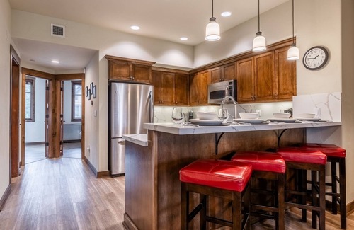 Woodwinds Casa | Updated Woodwinds Townhome! Walk to the Village! 2 Car Garage! 2 Decks!