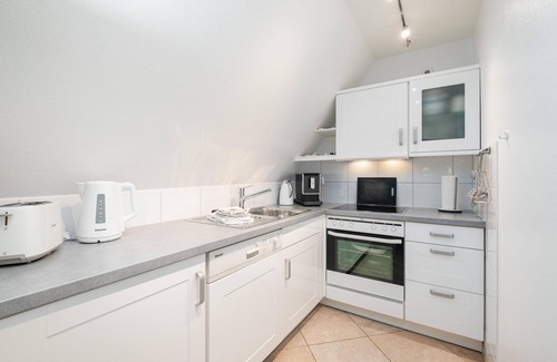 Norddorf Apartamento | Upper floor apartment on 2 levels, up to 4 persons, with beach chair in the garden