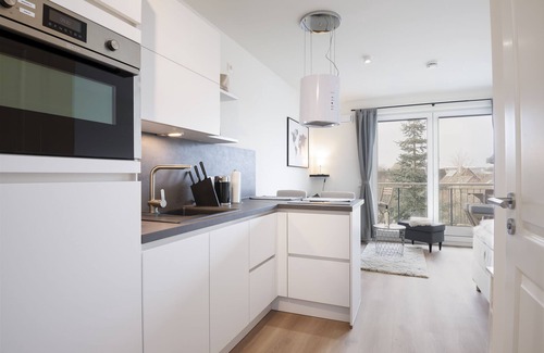 Neustadt in Holstein Apartamento | Vacation apartment Kleine Perle in house Pier 67 with balcony in Neustadt