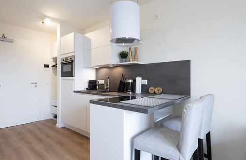 Neustadt in Holstein Apartamento | Vacation apartment Kleine Perle in house Pier 67 with balcony in Neustadt