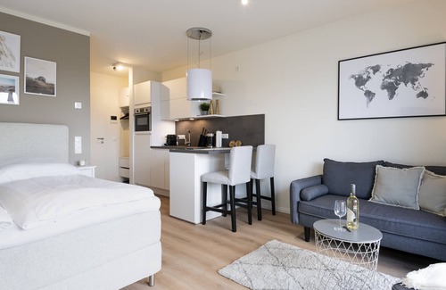 Neustadt in Holstein Apartamento | Vacation apartment Kleine Perle in house Pier 67 with balcony in Neustadt