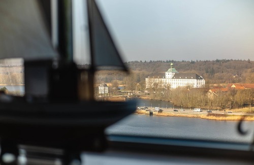 Schleswig-Flensburg District Apartamento | Vacation apartment "Wikingturm Etage 14 Nr. 1" with a view of Schleswig and the Schlei