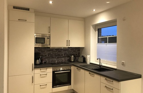 Geeste Apartamento | Vacation apartment with sauna and stove - right on the water and close to the lake