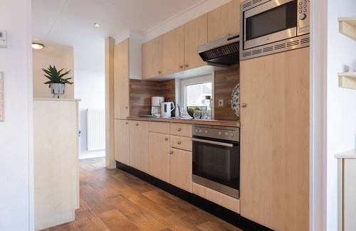 Dorumer Neufeld Casa | Vacation bungalow Mellumplate 12 with sun terrace and ground floor