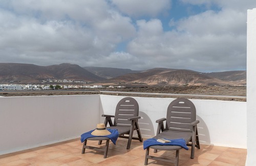 Arrieta Casa | Casa Vacacional 'La Casita Villalba' con Vista al Mar, Terraza Privada y Wi-Fi