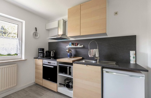 Niebuell Casa | Casa de vacaciones "Niebüllhus" con terraza privada y Wi-Fi