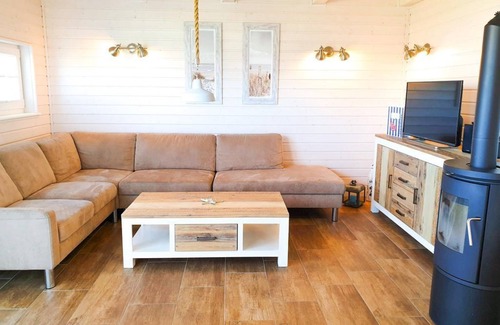 Schonberg Casa | Vacation home Ostseelodge - Holiday home with sauna, fireplace, garden house