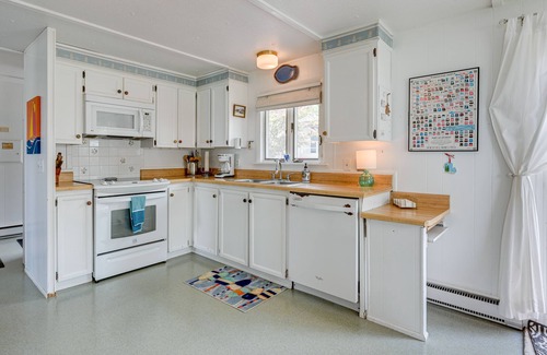 Tawas City Cabaña | Vibrant Waterfront Vacation Rental on Lake Huron!