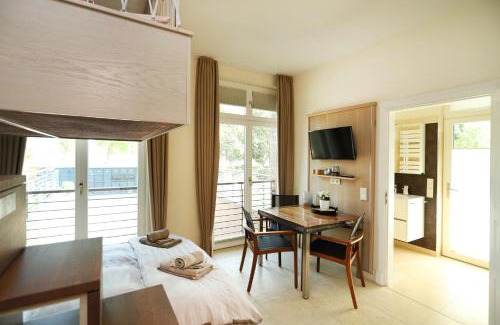 Hohe Dune Apartamento | Villa Schmidt Apartments - Strandhaus direkt am Meer mit Sauna, Sport und Dünengarten III