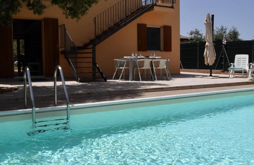 Alghero Villa | Villa con piscina rodeada de olivares. Con vista al mar. Casa en campagna.