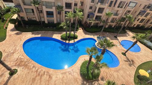 Soualem Trifiya Apartamento | Vue piscine et accès rapide à la plage