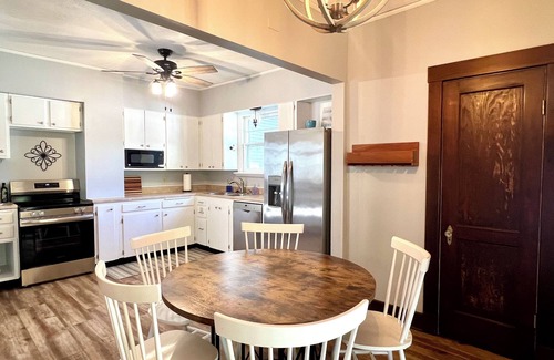 Salina Casa | Walk downtown, Charming 3 BR -2 King beds, Porch, Fire Pit, Theatre, Fenced Yard