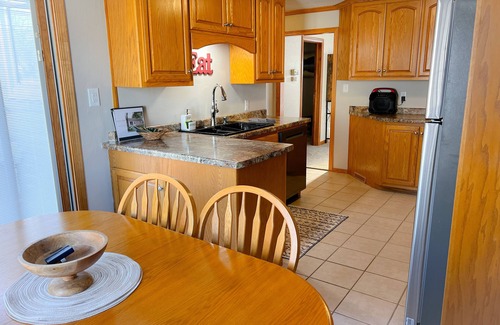 Green Bay Casa | Walk to Lambeau Field! Cozy 2 bedroom, 1 bath. Sleeps 8