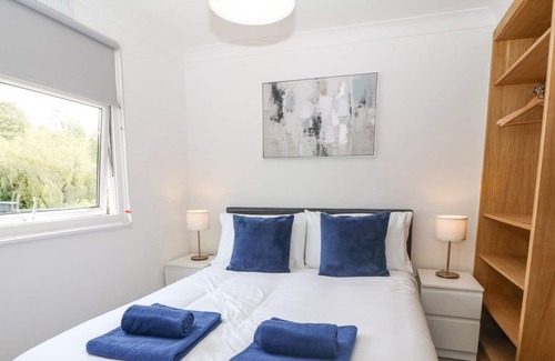 Bont Newydd Cabina | WATER'S EDGE, 44 GLAN GWNA, pet friendly, with a garden in Caernarfon