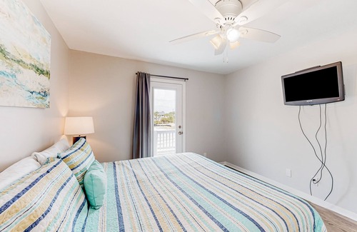 Perdido Key Coves One Casa | Water-view home with balcony & boat dock & tennis court access