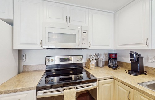 New Smyrna Beach Condominio | Waterfront condo with pool,beach access, and resort amenities