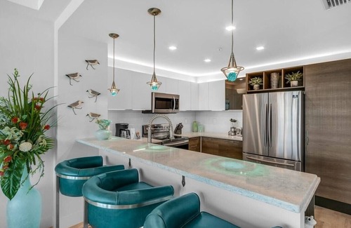 Merritt Island Condominio | Waterfront Condo: Pool, Hot Tub & Water Views!