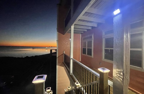 Ono Island Casa | Waterfront Coral by the Sea! Dolphins! Pets Ok!