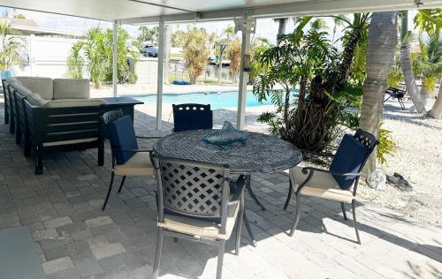 Flor-a-mar Casa | Waterfront Getaway with Pool, Dock & Kayaks