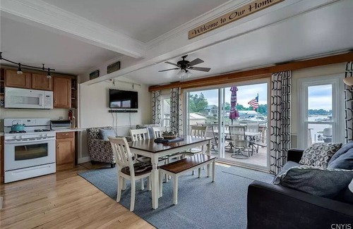 Alexandria Bay Casa | Waterfront Home with dock and a sunset view