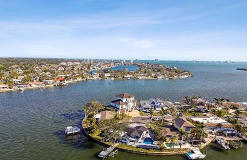 St. Petersburg - Clearwater Villa | Waterfront Home with Heated Pool 2 Miles from Beaches
