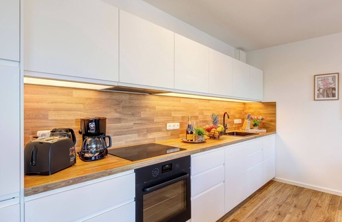 Koelpinsee Apartamento | Welcome to the vacation apartment Mr. Amber in the Bernsteinquartier in Kölpinsee!