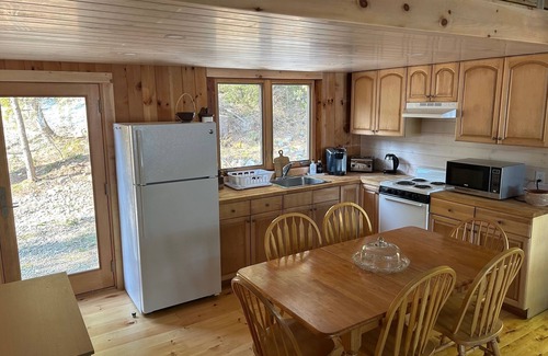 Otis Cabina | Welcoming 4-bedroom lake front cabin in charming Otis on Beech Hill Pond.