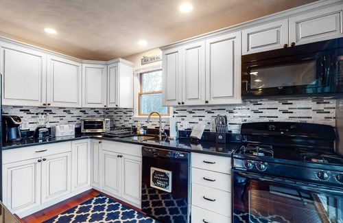 East Chop Casa | Wonderful three-story home with lovely decks, firepit, fast WiFi & washer/dryer