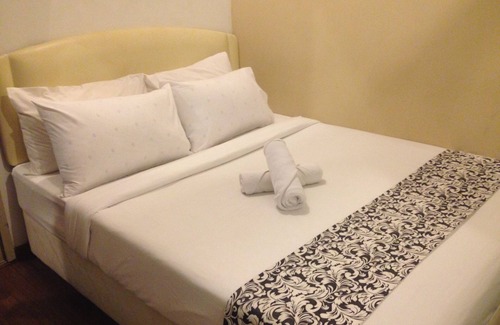 Kampung Surabaya Hotel | Woodpecker Lodge Kuching