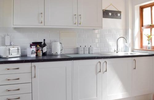 Cardigan Casa | Woodpecker Rest