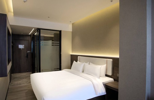 Decheng District Hotel | World Smart Hotel Dezhou Railway Station