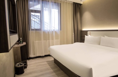 Decheng District Hotel | World Smart Hotel Dezhou Railway Station