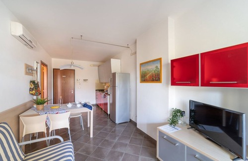 Bibione Pineda Apartamento | Tu escapada de vacaciones: Apartamento moderno con acceso a la piscina