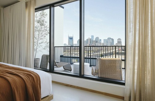 East Bank Hotel | Your Perfect Nashville Getaway: Penthouse with Outdoor Balcony and Lounge Area