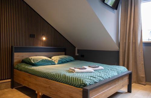 Ouddorp Casa | Zeeschelp - Comfortabele kamer bij B&B Gezond aan Zee - Toegang Wellnesstuin meerprijs