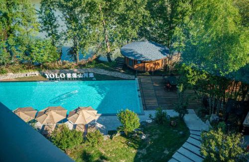 Yongding Casa | Zhangjiajie YOLO RELIAN Mt and River Collection-Riverside hotel with sunrise,sunset views, ticket service for attractions, afternoon tea,coffee, and laundry service