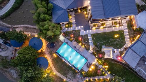 Yongding Casa | Zhangjiajie YOLO RELIAN Mt and River Collection-Riverside hotel with sunrise,sunset views, ticket service for attractions, afternoon tea,coffee, and laundry service