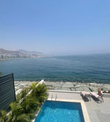 سحر المحيط لتأجير بيوت العطلات ocean magic luxury 4BR villa with privet pool, direct sea view,sharm-Al Dana Villa, Al Dana island by ocean magic holiday homes