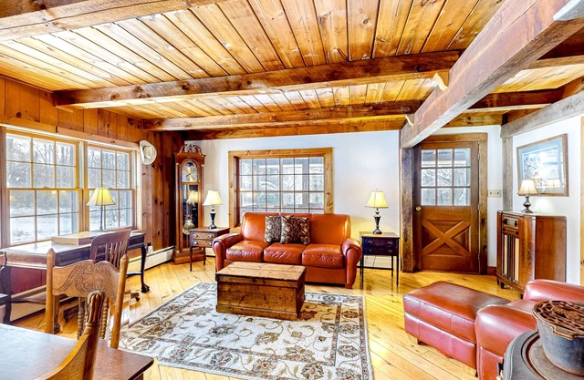 1970s acreage surrounded by trees with deck, grill, & internet