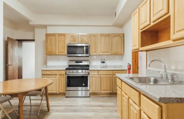 2 bed across shopping plaza