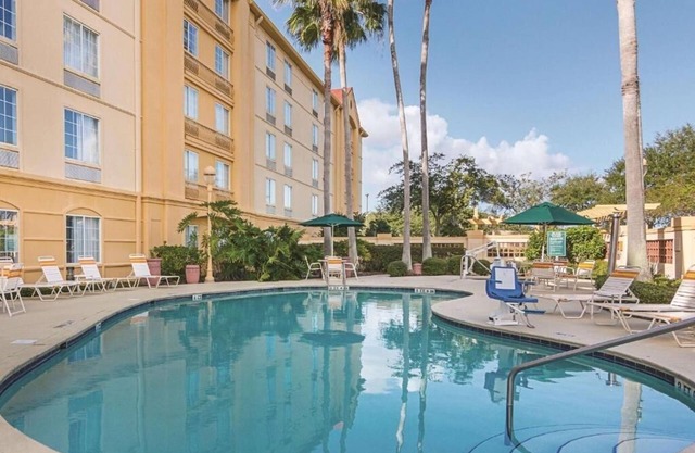 2 Convenient Rooms w/ Breakfast + Complimentary Shuttle | Onsite Pool