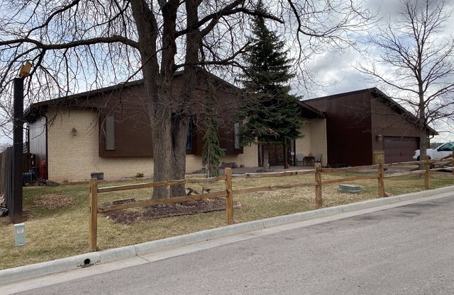 3,900 sq ft house with a big deck and a great view of the hills and canyon lake