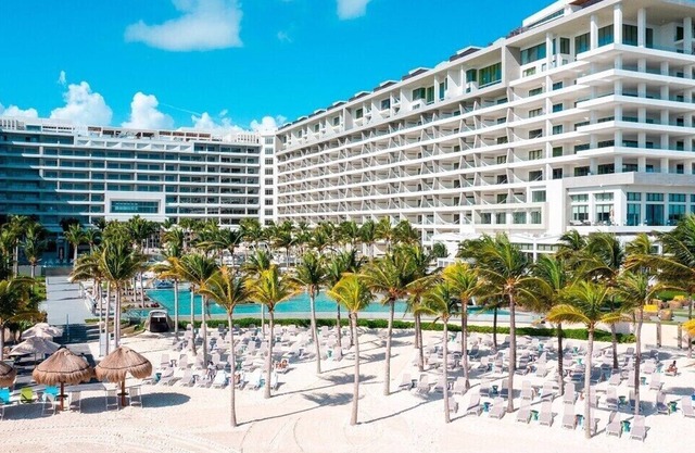 3 Bedroom Ocean View with furnished balcony and hot tub along with hammocks.
