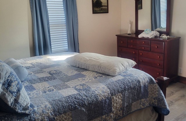 4-bedroom farm house in charming Lawrenceburg with a pool and hot tub.