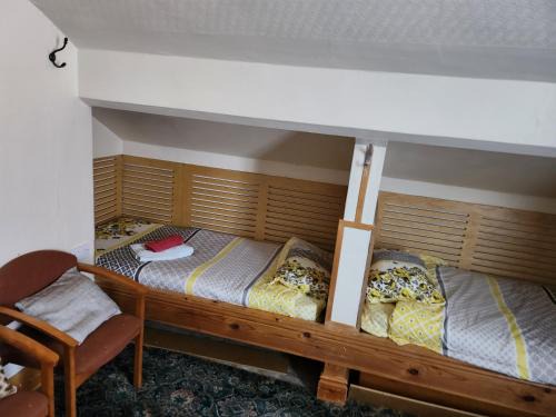 4 single beds shared bathroom