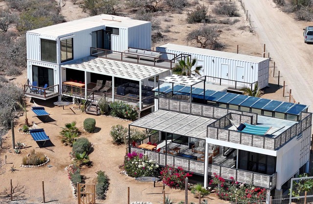 5BR/4BA repurposed shipping containers. Game room w/ smart darts, shuffleboard, video games, Infinity board game, new 8 person hot tub, multiple decks w/ firepits, fast Wifi ( 250 mb+)w/ Starlink backup. Use of 2 SUPs. Daily housekeeping optional.