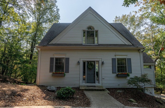 A beautiful mountain retreat nestled in the woods with great Mountain Views