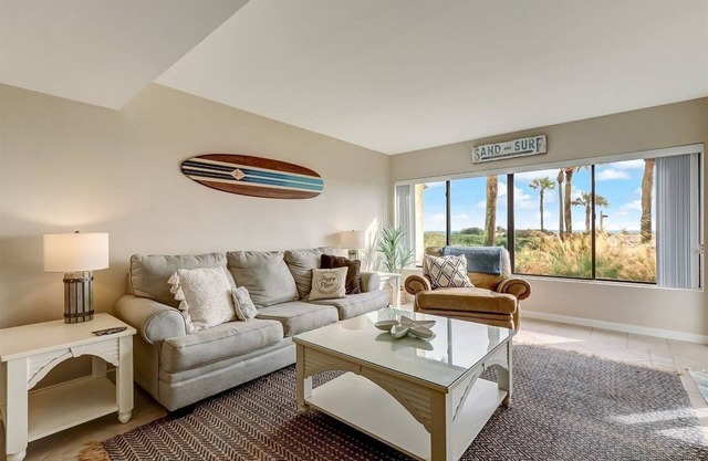 A bright oceanfront condo on the first floor at the Amelia Surf & Racquet Club