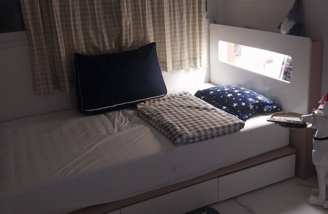 A cozy place with a double bed with 65 inches TV. Free Netflix and Youtube