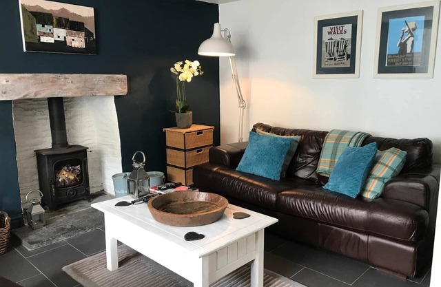 A delightful seaside stone cottage, just a minute's walk from the beach.